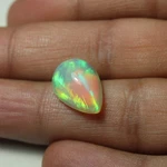 6.5 Ct Real Aaa Green Yellow Fire Ethiopian Opal Pear Shape Cabochon 16.6X11.6MM. Fixed Price $87.73.