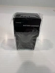 Rohs Video/ Digital Camera Travel Charger 100V-240V 50/60HZ Dc 4.2V. Fixed Price $6.00.