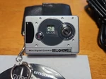 Vintage Bell Howell Mini Digital Spy Camera On Keychain. Fixed Price $16.00.