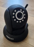Foscam Black FI9831P Hd 1280X960P Wireless Pan/tilt Ip Camera + Power Adapters. Fixed Price $25.00.