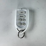 Radioshack 49-1002 Remote Control White Plug 'n Power Security Wireless Key Fob. Fixed Price $11.24.