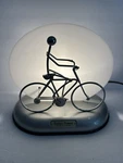 Solar Motion Bicycle Rider Lamps By Ishiguro. Fixed Price $39.99.